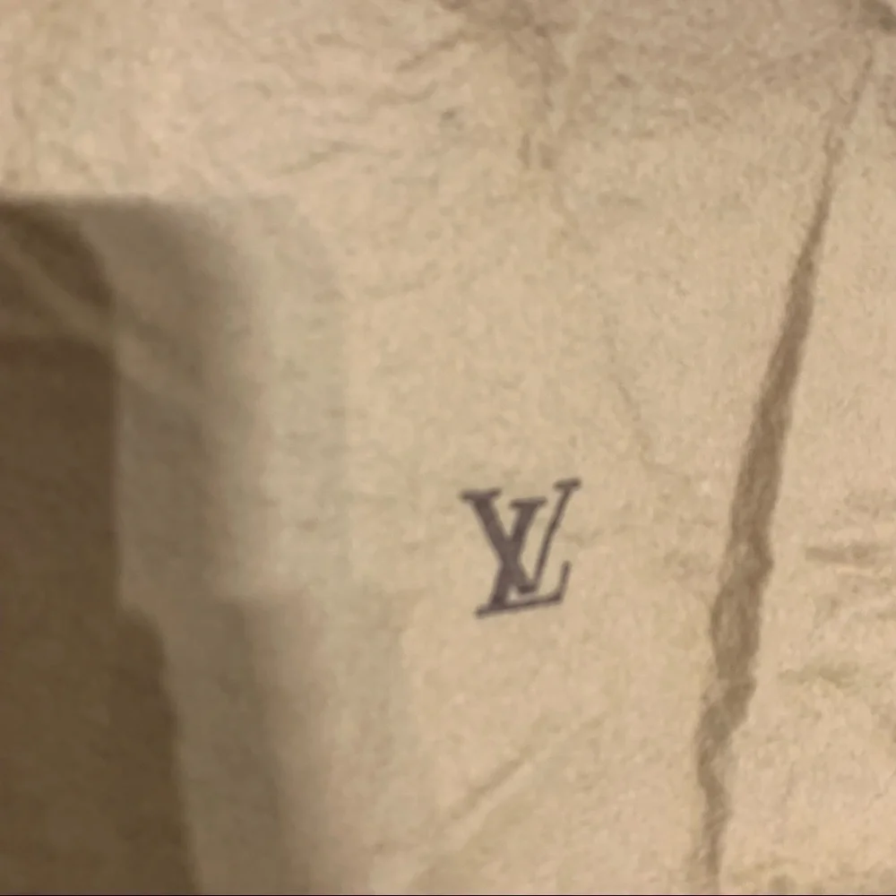 Louis Vuitton vintage dust bag fold over flap tan purse bag medium size